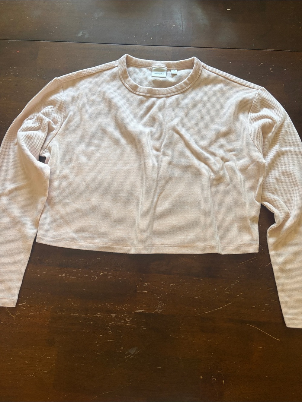 Aritzia cropped waffle long-sleeve top in pale pink